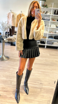 Norma Kamali Pleated Pickleball Faux Leather Skirt in Black